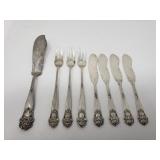 Group of sterling silver forks and butter knives
