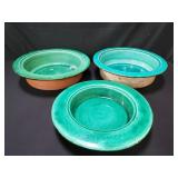Three terracotta glazed bowls