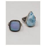 Sterling silver rings one with an Aurora opal