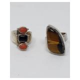 Sterling silver rings one with onyx and coral,