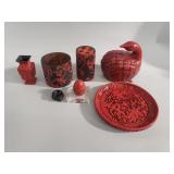 Group of cinnabar vases, egg, plate, and wood