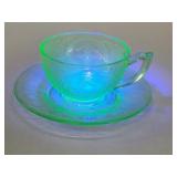 Uranium glass cup and saucer
