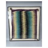 Acrylic framed handwoven Navajo style blanket