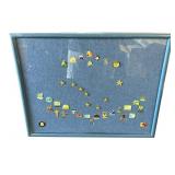 Framed vintage Alaska pins