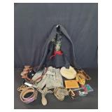 Box of miscellaneous leather and steel belts,