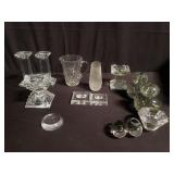 Group of crystal candle sticks, eggs and vase