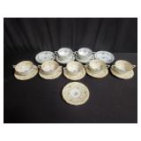 Group of porcelain teacups and saucers