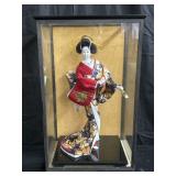 Vintage Japanese doll in display case