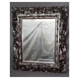 Vintage ebonized carved wood mirror