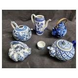 Group of blue and white porcelain asian teapot