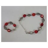Silver and coral necklace and bracelet.