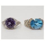 Sterling silver rings one with blue topaz, one