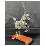Asian silver plate horse figurine on a wood stand