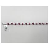 Sterling silver and pink topaz tennis bracelet