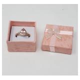 Sterling silver, pink topaz, and white topaz