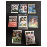 Assorted sports trading cards (8)
