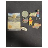 Lot of 7 collectible pins, 1 golden nugget coin