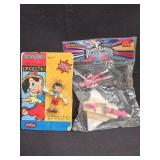 Lot of 2 collectible toys Pinocchio,  power