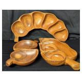 Group of vintage monkey pod  bowls and trays
