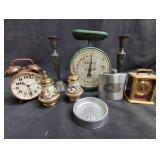 Group of candlesticks, clocks, vintage scale