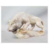 Carved marble cougar sculpture