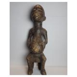 Vintage African carved wood Asie Usu statue