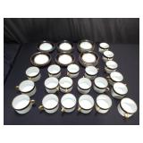 Fitz and Floyd porcelain teacups and saucers