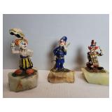 Three Ron Lee clown sculptures