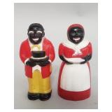 Pair of vintage Black Americana plastic salt and