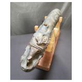 Vintage carved wood totem on stand