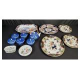 Group of porcelain Asian plates, teapots, tea