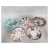 Group of Asian hand painted porcelain plates