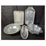 Group of aluminum and silver plate bowls and trays