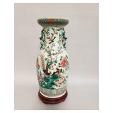 Vintage Chinese porcelain vase on wood base