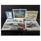 Group of aviation posters and photos in a