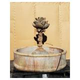 Cement fountain floral centerpiece