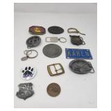 Group of belt buckles, pins, etc