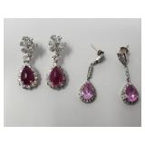 Two pairs of sterling silver, pink sapphire, and