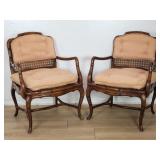 Pair of vintage faux bamboo and caned arm chairs