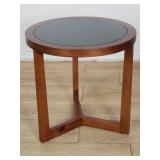 Contemporary circular side table with glass insert