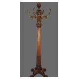 Vintage carved mahogany and brass coat rack