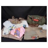 Group of vintage shirts, duffle bag and jump suit