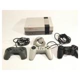 Vintage Nintendo gaming console & controllers