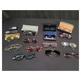 Group of sunglasses and reading glasses