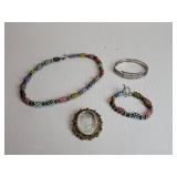 Costume necklace, bracelets and brooch