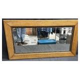 Vintage oak-framed mirror with beveled glass
