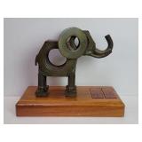 Scrap metal folk art elephant sculpture on a