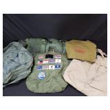 Group of vintage military backpacks and duffle