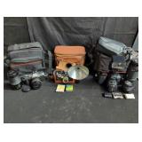 Group of vintage 35mm cameras and accesories