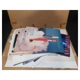 Group of aviation, cars, and NASA posters